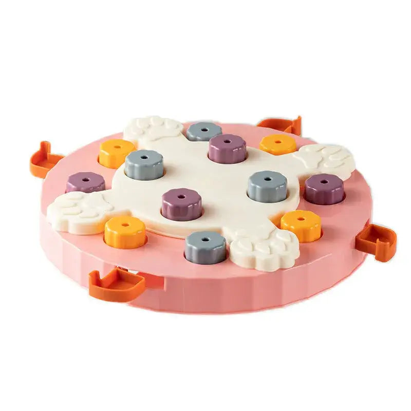 Gâteau jouet interactif rose avec glaçage orange et violet pour la santé digestive du chien